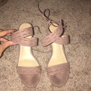 Strapped pink box heels.